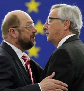 President of the European Commission Jean-Claude Juncker, right, discusses with President of the European parliament Martin Schulz before delivering his statement on growth, jobs and investment package for Europe, Wednesday Nov 26, 2014 at the European Parliament in Strasbourg, eastern France. (AP Photo/Christian Lutz)