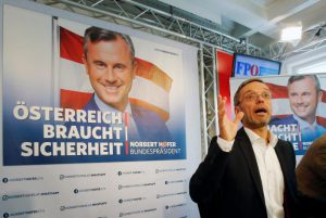 Austrian Freedom Party (FPOe) Secretary General Herbert Kickl presents campaign posters of FPOe candidate Norbert Hofer for a re-run of the run-off presidential election in Vienna, Austria August 24, 2016. Poster reads "Austria needs safety". REUTERS/Heinz-Peter Bader